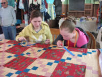 Nikki and Naomi with their quilt